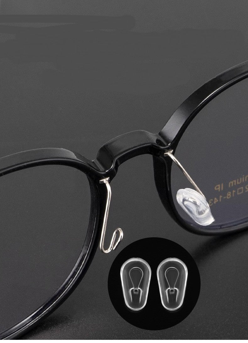 White silicone push-in replacement nose pads for compatible eyeglasses