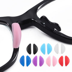 Plug-in silicone nose pads, close-up profile and mounting detail