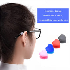 Heart-shaped silicone eyeglass ear grips, fit and opening detail