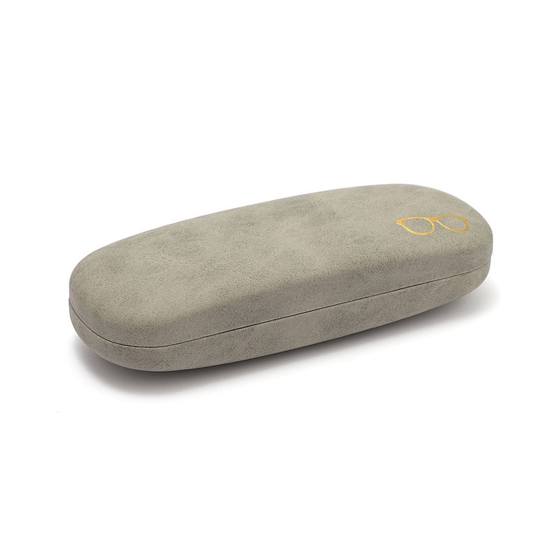 Fabric-covered hard eyeglass case, closure and shell detail