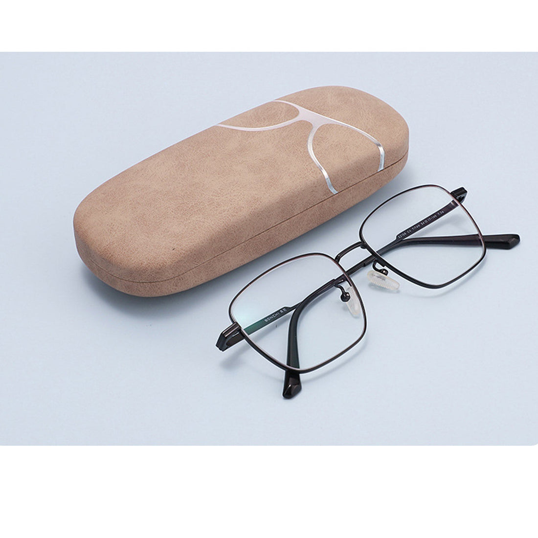 Hard EBJDE eyeglass case used for protected storage away from vehicle heat