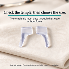 One pair of clear slip-on ear grips on a cloth with unbranded frame detail