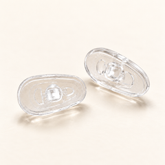 One pair of clear G13 13mm screw-in silicone nose pads