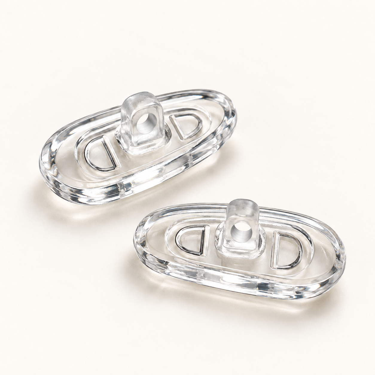 One pair of clear G14 14mm screw-in silicone nose pads
